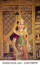 A young Thai girl and man dressed in a beautiful pantomime dressed in the character of Phra, Nang dancing in a Thai pantomime performance; Khon is traditional dance drama art of Thai classical masked
