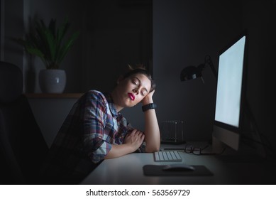 Young Tired Businesswoman Working In The Night Shift At Home.