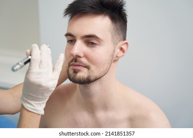 Young Topless Man During Check Up In Neurologist Office