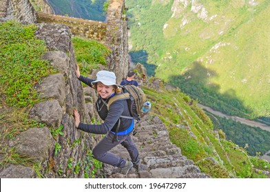 Young Tourist Climbing Huayna Picchu (Machu Picchu, Peru)