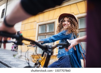 Young Tourist Couple Travellers With Electric Scooters In Small Town, Talking.