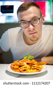 Young Tourist Eating Singapore Style Hot Chilli Crab Served On China Town. South East Asia Seafood Dish.