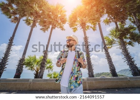 Image, Stock Photo Man traveling solo by train looking outside the window