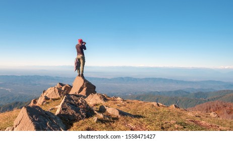 Young Traveler Standing On Top Cliff Stock Photo (Edit Now) 1558471427