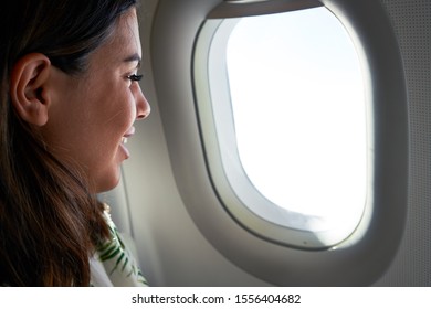 Young Traveller Woman Sitting Inside Plane Stock Photo 1556404682 ...