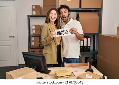 Young Two People Holding Black Friday Banner At Small Business Store Celebrating Crazy And Amazed For Success With Open Eyes Screaming Excited. 