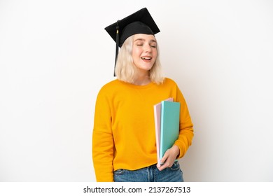 Young university caucasian woman graduate isolated on white background laughing