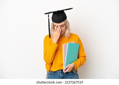 Young university caucasian woman graduate isolated on white background with tired and sick expression