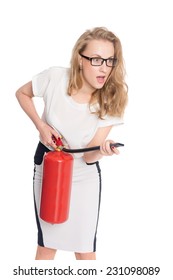 Young Uptight Woman With A Fire Extinguisher Isolated On White