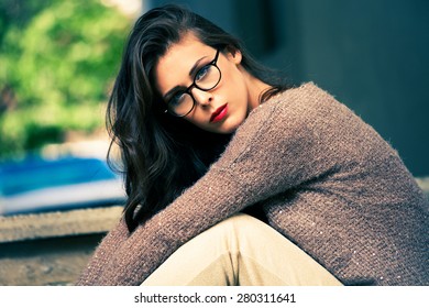 Young Urban Fashion Woman Wearing Eyeglasses Outdoor Shot In The City