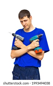 A Young Utility Worker Holds Electric Screwdrivers In His Hands. Portrait. The Guy Crossed His Arms With The Instrument On His Chest. Isolated On A White Background.