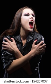 Young Vampire Girl Isolated On Black