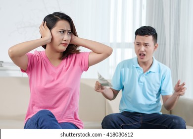 Young Vietnamese Couple Fighting About Money