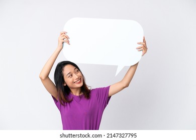 Young Vietnamese woman isolated on white background holding an empty speech bubble - Powered by Shutterstock