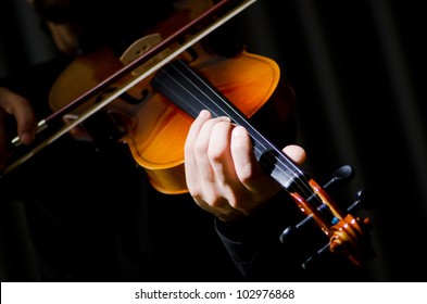 Young Violin Player Playing