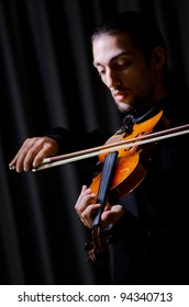 Young Violin Player Playing