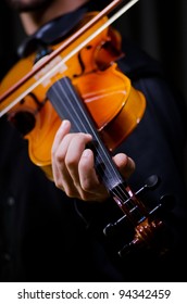 Young Violin Player Playing