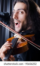 Young violin player playing