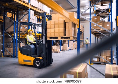 Young warehouse workers working together. - Powered by Shutterstock