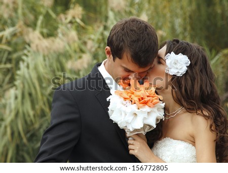 young wedding couple, beautiful bride with groom, summer nature outdoor
