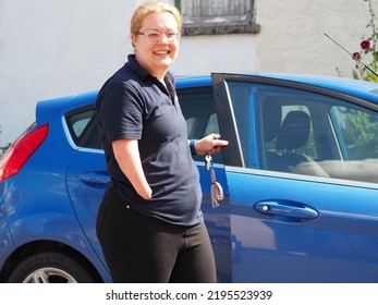 Young White Female With Limb Deformation Driving To Work