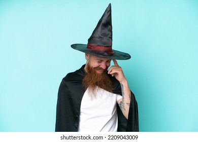 Young Wizard In Halloween Isolated On Blue Background Laughing