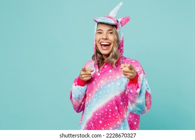 Young woman 20s wear domestic costume with hoody and animals ears point index finger camera on you motivating encourage isolated on plain pastel light blue cyan background. People lifestyle concept - Shutterstock ID 2228670327