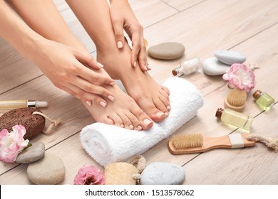 Young woman after spa pedicure treatment in beauty salon