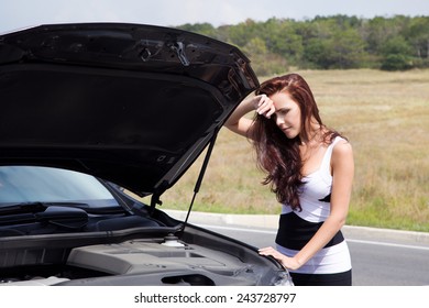 Young Woman Alone On A Road Grieved Problem With The Car