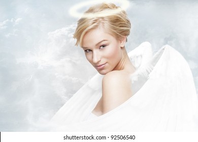 Young woman as an angel