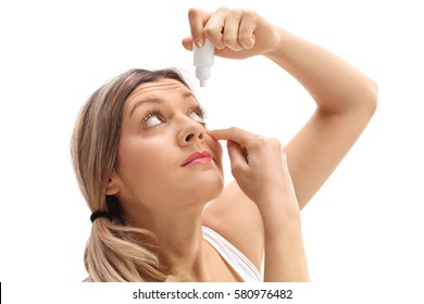 Young Woman Applying Eye Drops Isolated On White Background