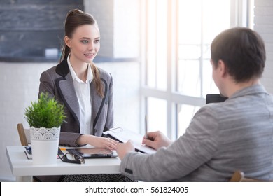 Young Woman Arriving For A Job Interview. Business People Talking In Modern Office. Colloquy Dream Job