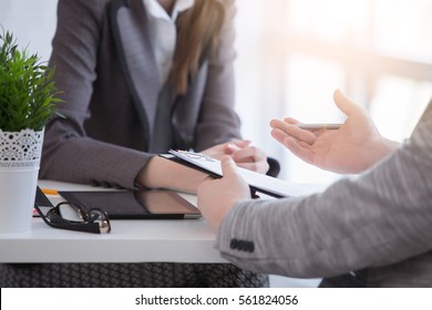 Young Woman Arriving For A Job Interview. Business People Talking In Modern Office. Colloquy Dream Job Close Up.