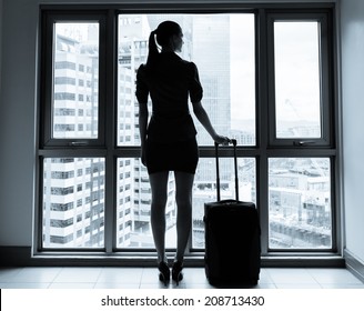 Young Woman Arriving In A New City - Travel, Moving Concept.