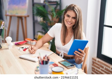 Young woman artist using