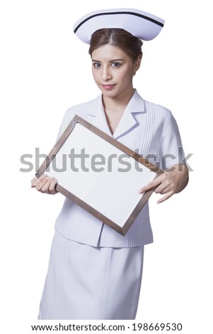 Young woman asian nurse attractive beauty brunette showing white singboard in white background
