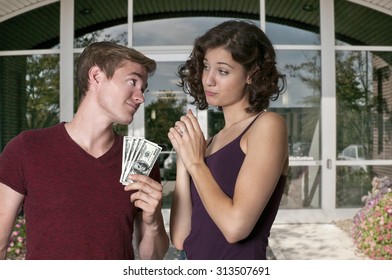 Young Woman Asking A Man For Some Cash Money