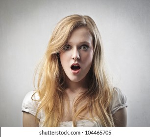 Young woman with astonished expression