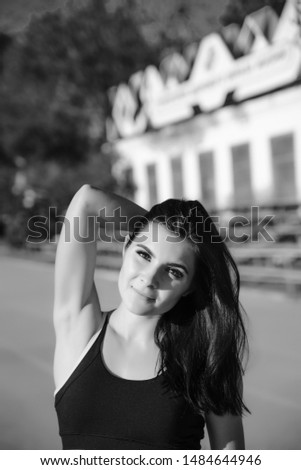 Similar – Image, Stock Photo Smiling brunette girl holding surfboard over her head