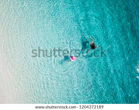 Similar – Sommerliche Luftansicht des klaren Ozeans Wasser voller Touristen