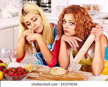 Young Woman  Baking Cookies In Oven. Bad Luck.