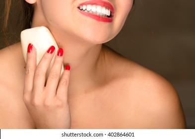 Young Woman Bare Skin Shoulders Using Bar Of Soap Applying To Neck.