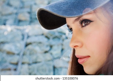 Young Woman In A Baseball Cap Portrait