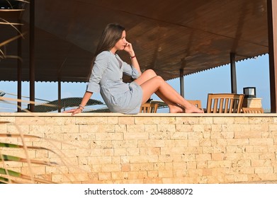 Young Woman Basking In The Sun.