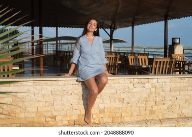 Young Woman Basking In The Sun.