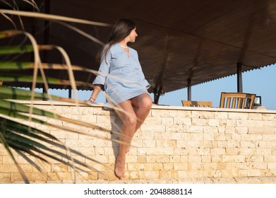 Young Woman Basking In The Sun.