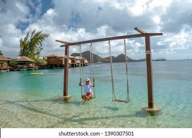 Young Woman At The Beach Of The Tropical Island Saint Lucia Or St Lucia Caribbean, Woman In Bikini On Holiday Vacation