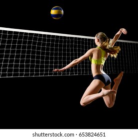 Young woman beach volleyball player isolated