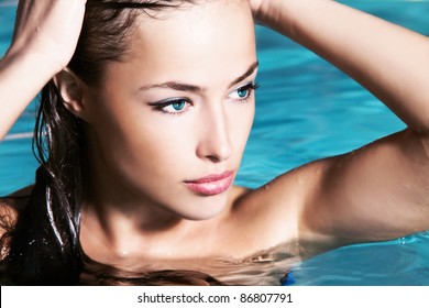 young woman beauty portrait in water