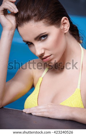young woman beauty portrait in water